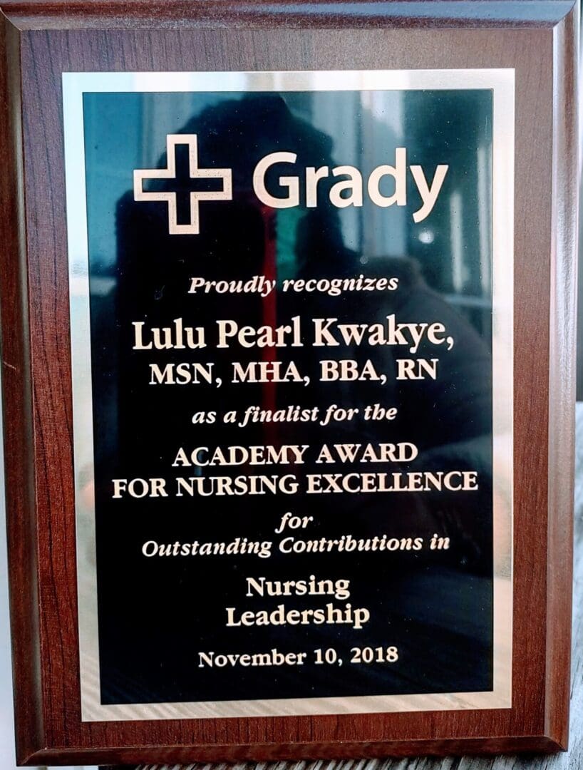 A plaque is displayed in front of the words " grady ".