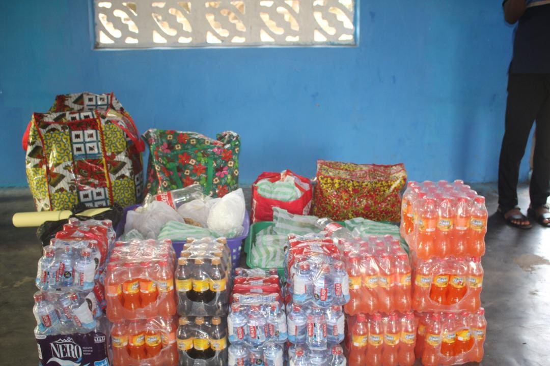 A room filled with lots of soda bottles and bags.