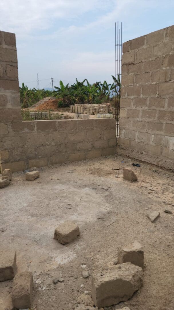 A room with bricks and rubble in it